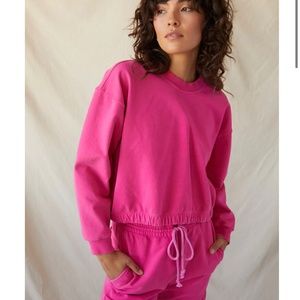 AMO hot pink cropped sweatshirt